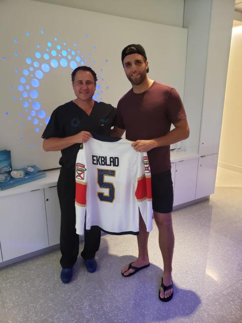 Dr. Albert with Panther player, Aaron Ekblad